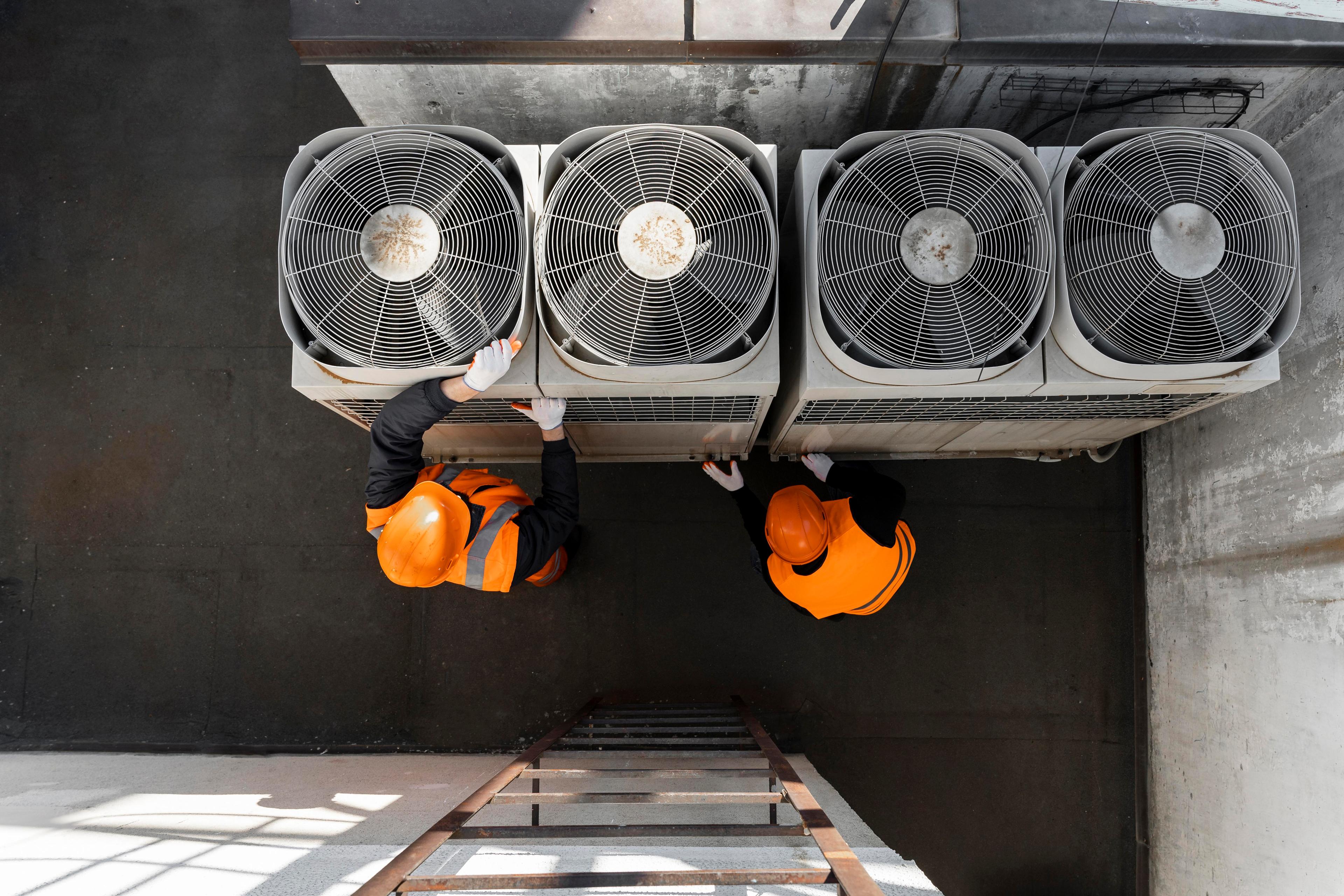 men-working-with-equipment-full-shot